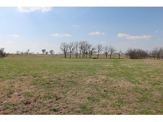 Tract 16 - LAND & MINERAL ACRES OKLAHOMA AUCTION, 588+/- Land & Producing Mineral Acres offered in 24 Tracts in Okmulgee County